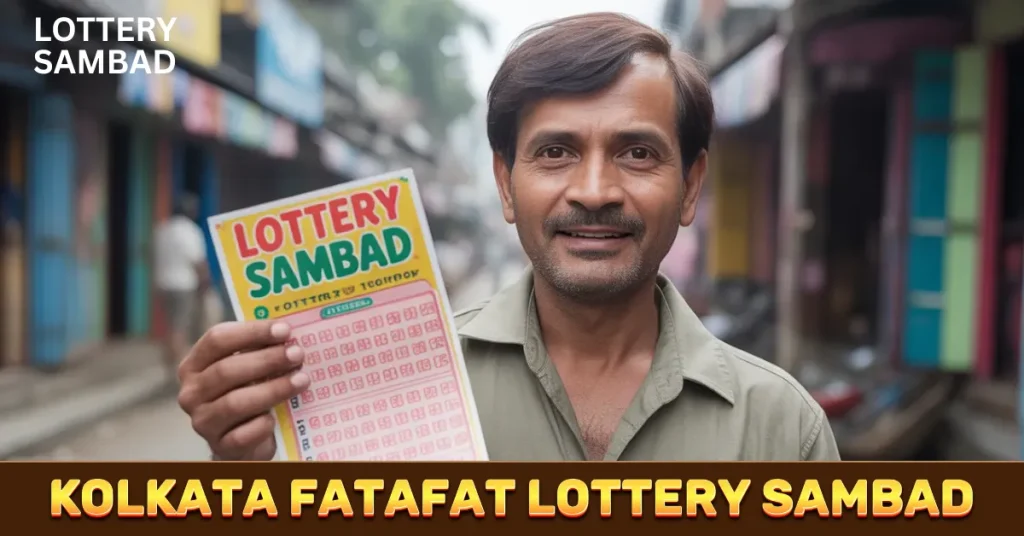 a man holding a kolkata fatafat lottery sambad and smiling in the front