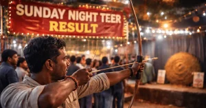Indian man aiming a bow at a Sunday Night Teer event under lights and a Sunday Night Teer Result banner