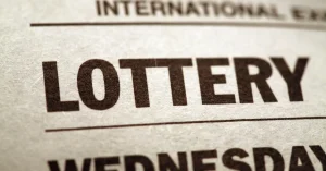 Lottery sambad 22 page showing the bold printed words "LOTTERY" and "WEDNESDAY" in large black text on aged paper
