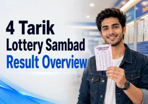 4 Tarik Lottery Sambad results held by a smiling man in a denim jacket for the image 4 tarik lottery sambad